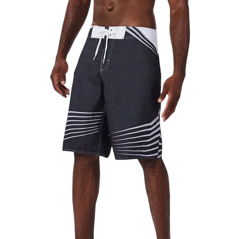 COMFORTH Men's black and white striped athletic board shorts with drawstring closure.