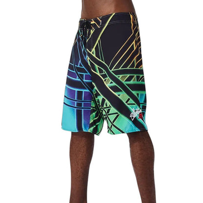 COMFORTH Men's athletic board shorts with abstract geometric print in black, blue, green, and yellow.
