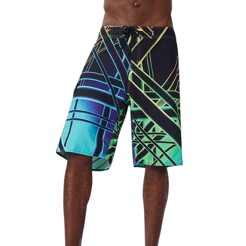 COMFORTH Men's athletic board shorts with abstract geometric print in blue, green, and black. Quick-dry fabric, drawstring waist.