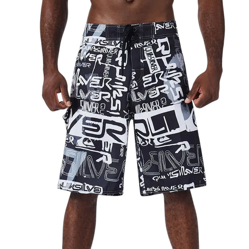 COMFORTH Men's black and white graphic print board shorts with drawstring closure.