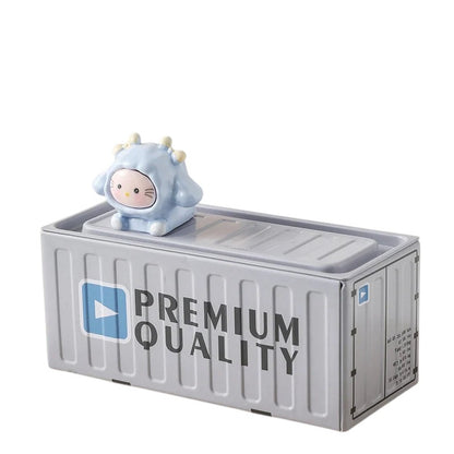 COMFORTH gray metal shipping container pen holder with a cute blue cartoon character on top.