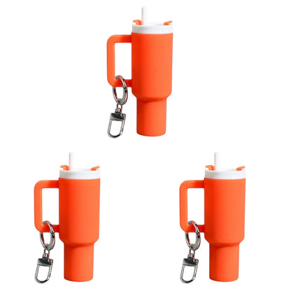 COMFORTH orange mini tumbler keychain with handle and straw, a fun and functional accessory.