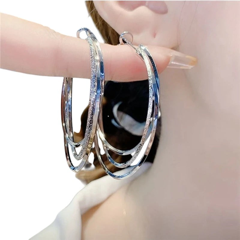 COMFORTH Elegant multi-layered hoop earrings with textured finish, silver tone metal.