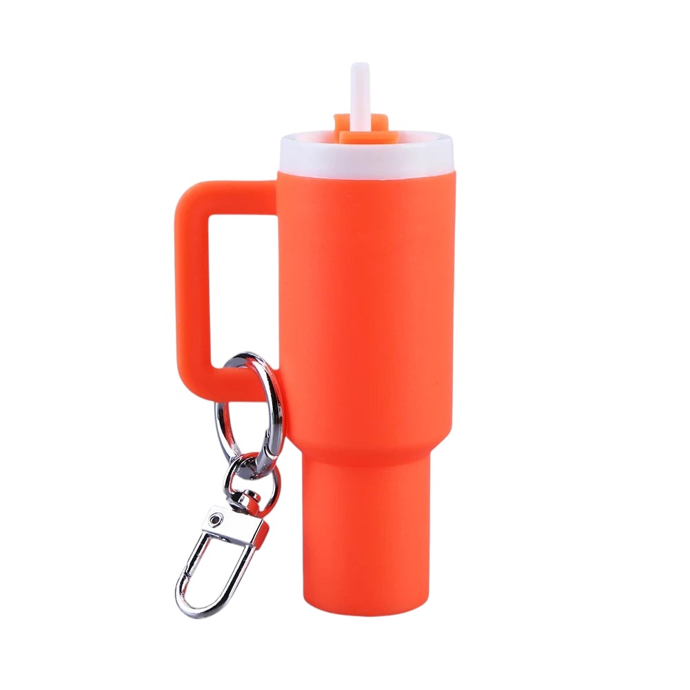 COMFORTH orange mini tumbler keychain with handle and straw, white lid, and silver keyring.