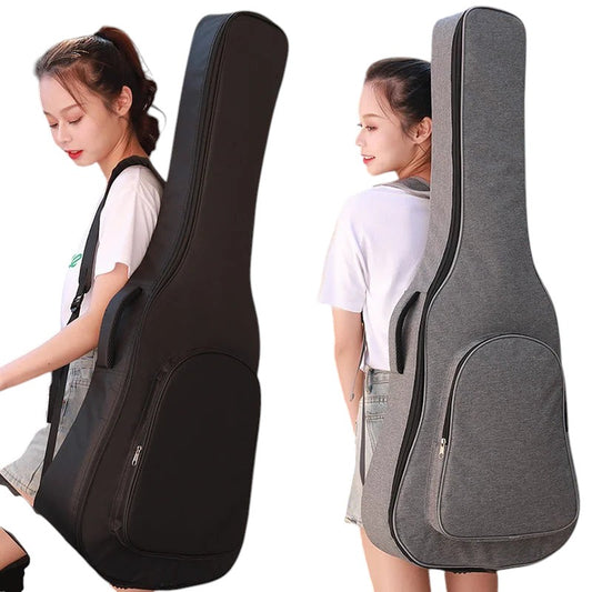 COMFORTH padded guitar gig bag in black and grey, with carrying handle and accessory pocket.