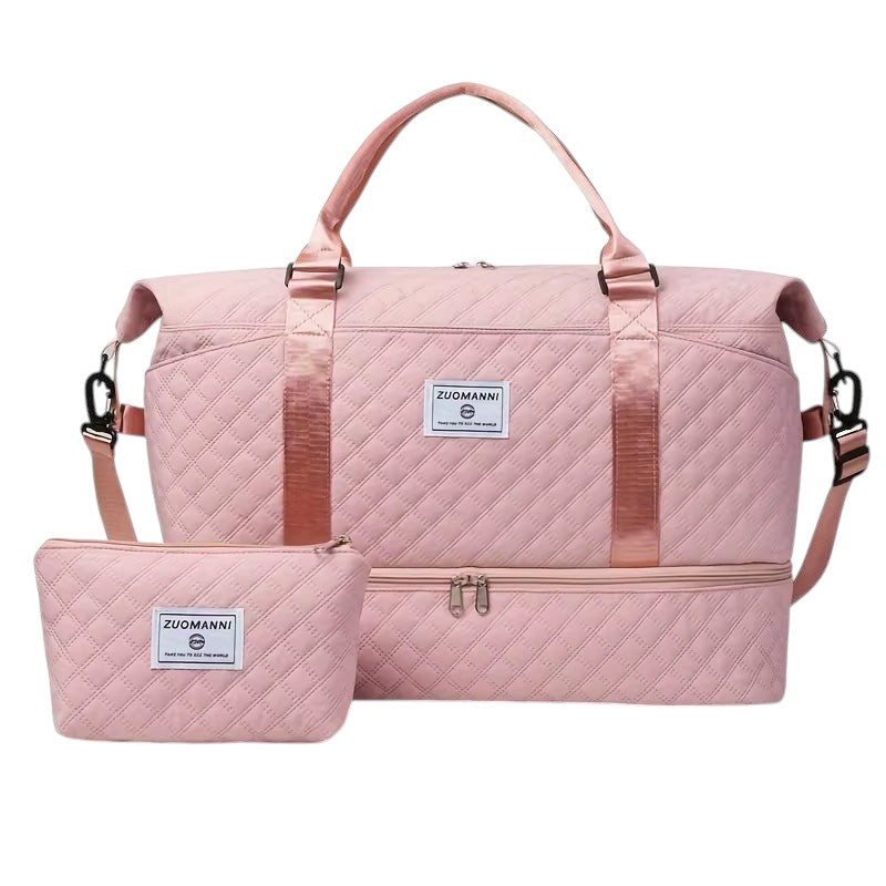 COMFORTH pink quilted duffel bag with matching pouch, featuring diamond quilting and a separate bottom compartment.