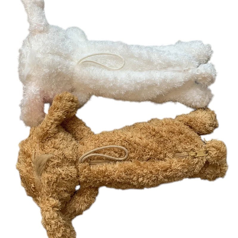 COMFORTH plush animal pencil cases in white and brown, made of soft fuzzy material, with zipper closure.