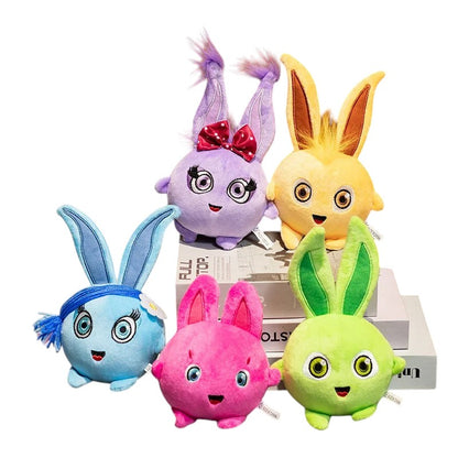 COMFORTH plush bunny toys in yellow, pink, blue, green, and purple with embroidered eyes and cute accessories.