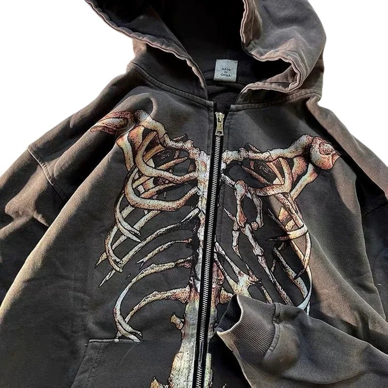 COMFORTH charcoal grey zip-up hoodie with distressed skeleton graphic, cotton blend, drawstring hood, and kangaroo pocket.