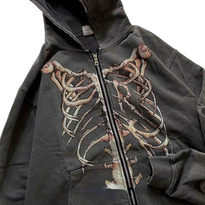COMFORTH charcoal grey zip-up hoodie with a distressed skeleton graphic on the chest and back. Cotton blend.