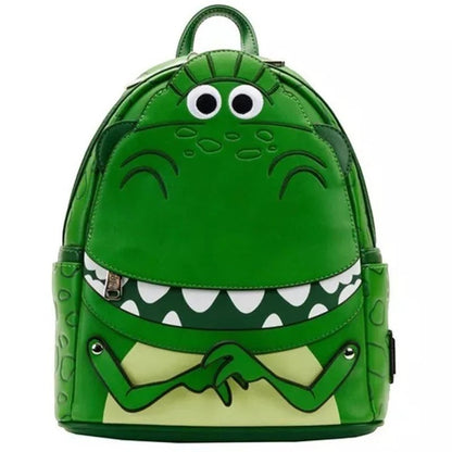 COMFORTH Toy Story Rex Dinosaur Backpack, green faux leather with googly eyes and wide grin.