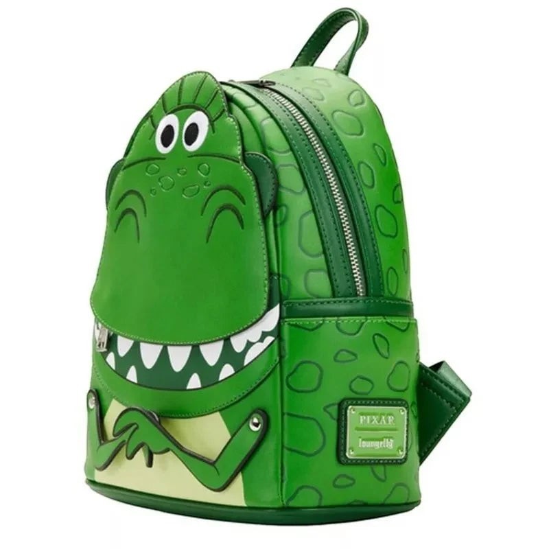 COMFORTH Toy Story Rex Dinosaur Backpack, a vibrant green faux leather bag with Rex's face, googly eyes, and outstretched arms.