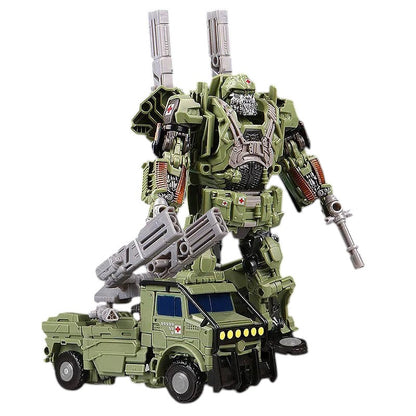 COMFORTH military medical vehicle transforming robot action figure with guns, green plastic