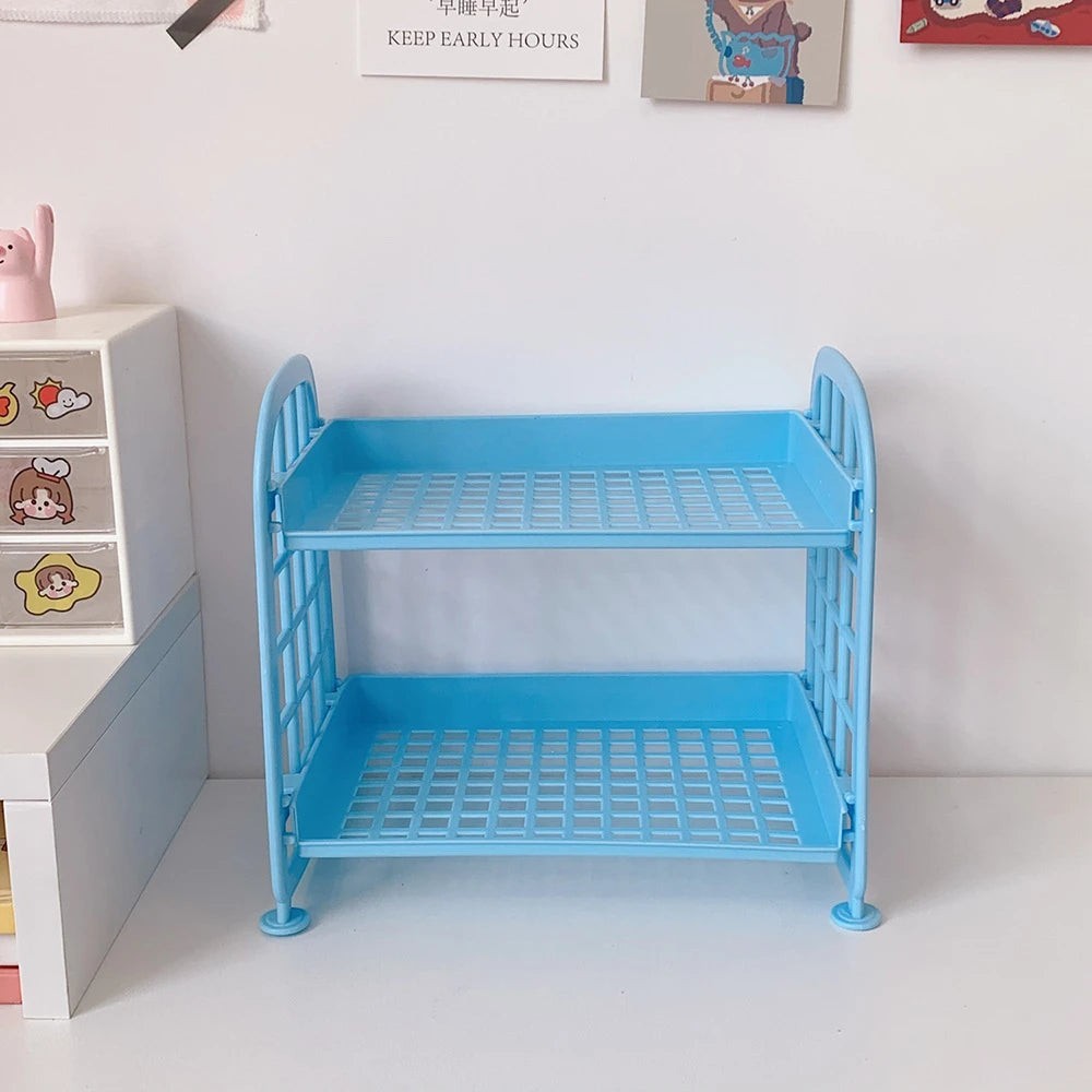 COMFORTH Two Tier Desk Organizer Shelf in light blue plastic with a bed-frame inspired design.