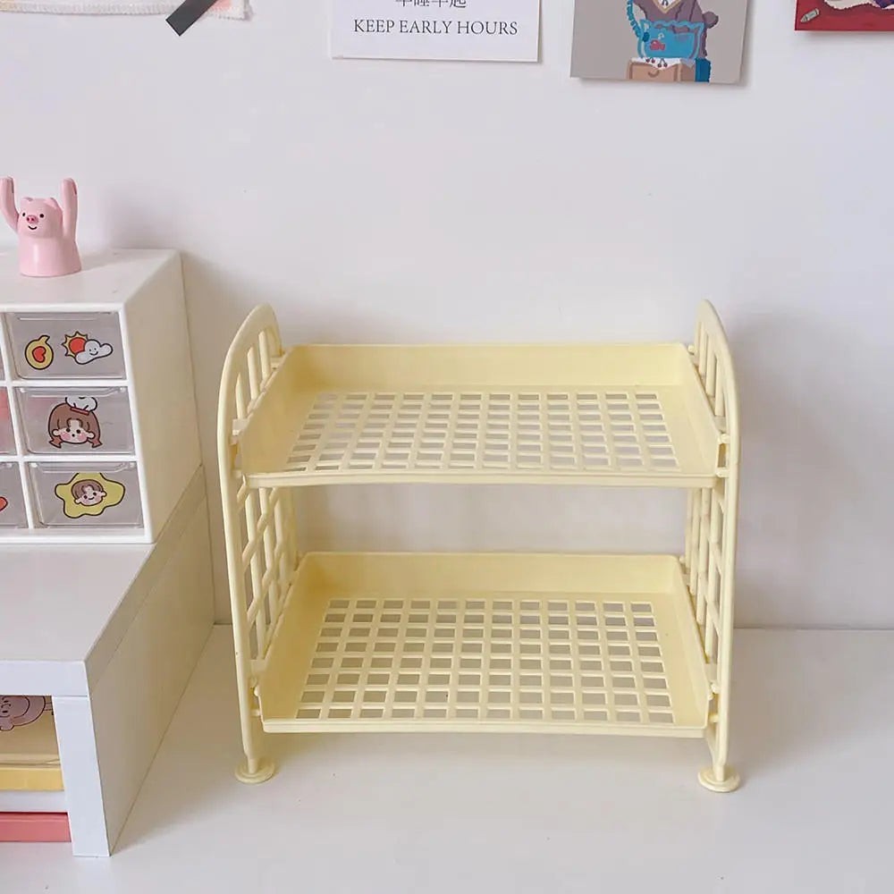 COMFORTH Two Tier Desk Organizer Shelf in pale yellow plastic with a bed-frame inspired design. Perfect for stationery or cosmetics.