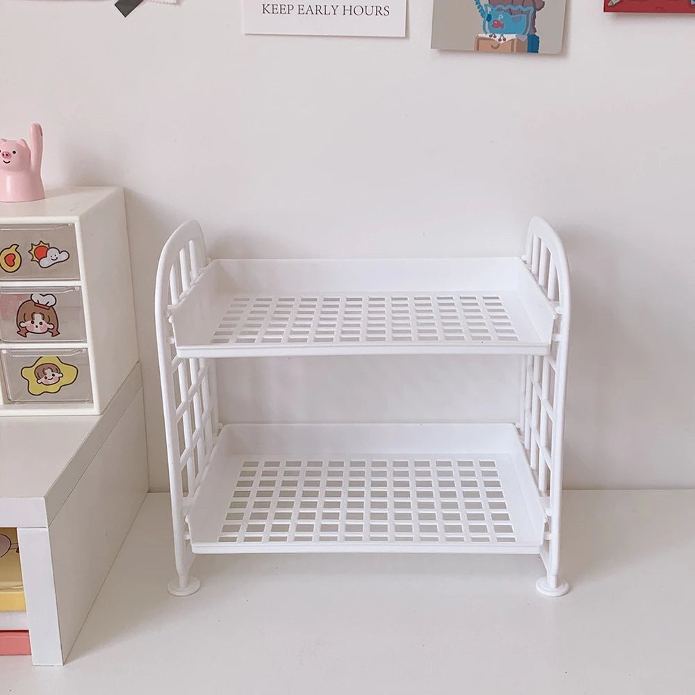 COMFORTH Two Tier Desk Organizer Shelf in white plastic, featuring a bed-frame inspired design with two open shelves for storage.