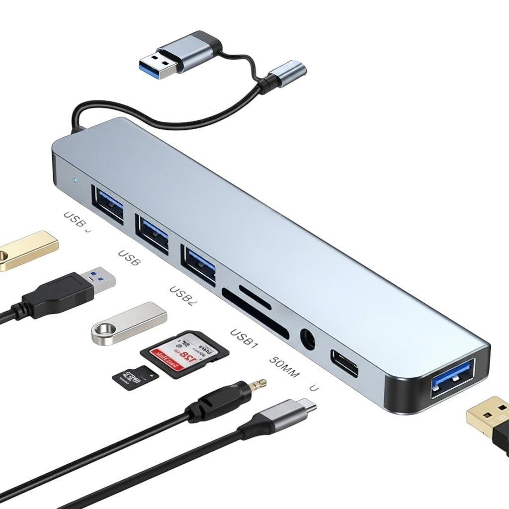 COMFORTH silver aluminum alloy USB C hub adapter with 3 USB 3.0 ports, SD/MicroSD card readers, audio jack, and PD port.