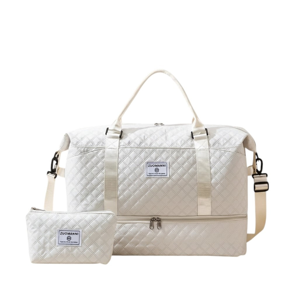 COMFORTH white quilted duffel bag with matching pouch, diamond-quilted pattern, separate bottom compartment, top handles, and shoulder strap.