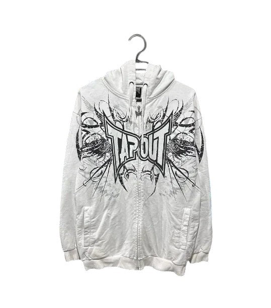 COMFORTH white zip-up hoodie with distressed black graphic print and drawstring hood.