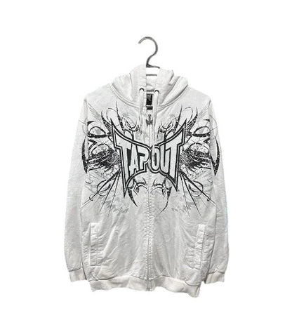 COMFORTH white zip-up hoodie with distressed black graphic print and drawstring hood.
