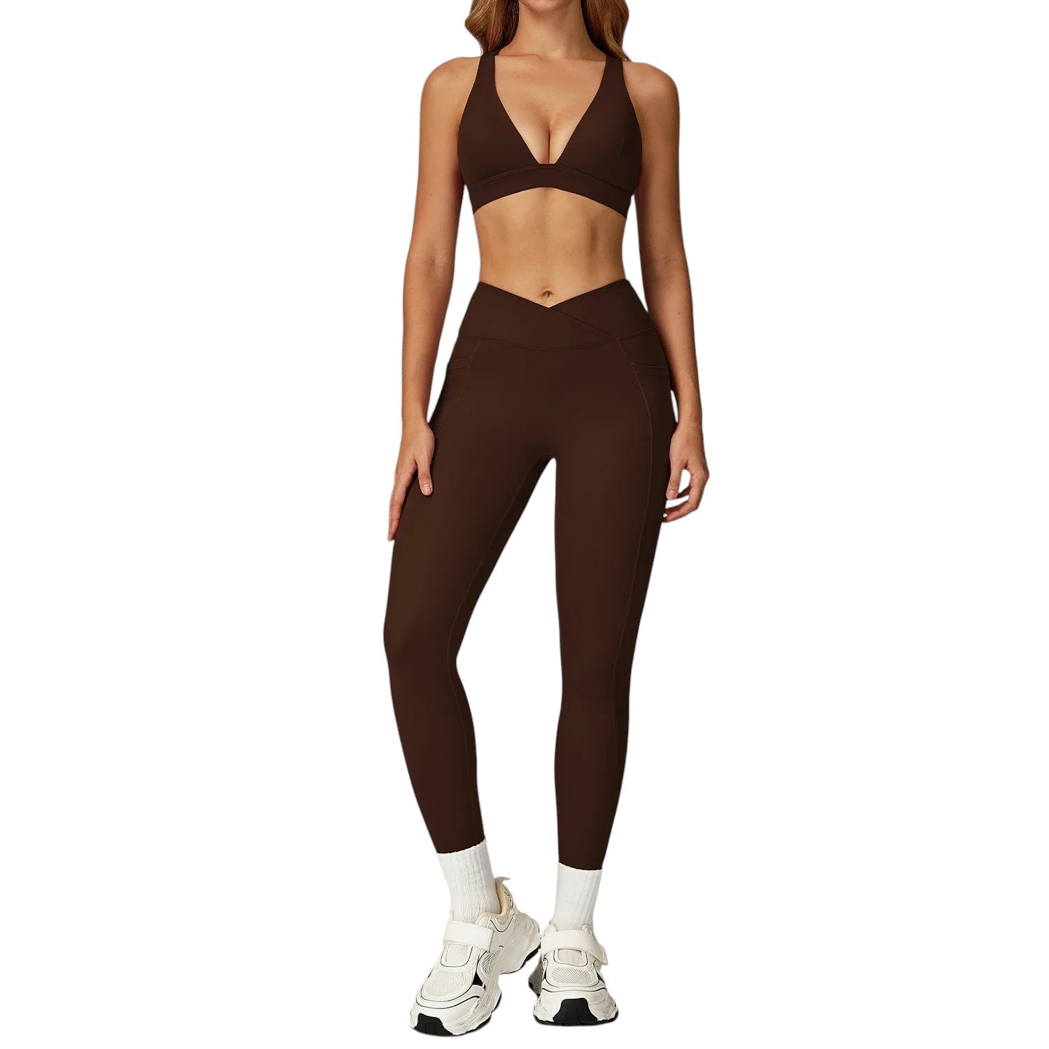COMFORTH women's brown athletic two-piece set with V-neck sports bra and V-waist flare leggings.