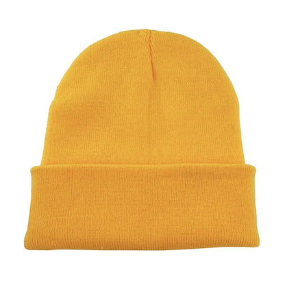 COMFORTHere yellow knit beanie hat featuring an embroidered Adventure Time Jake the Dog face with floppy ears.