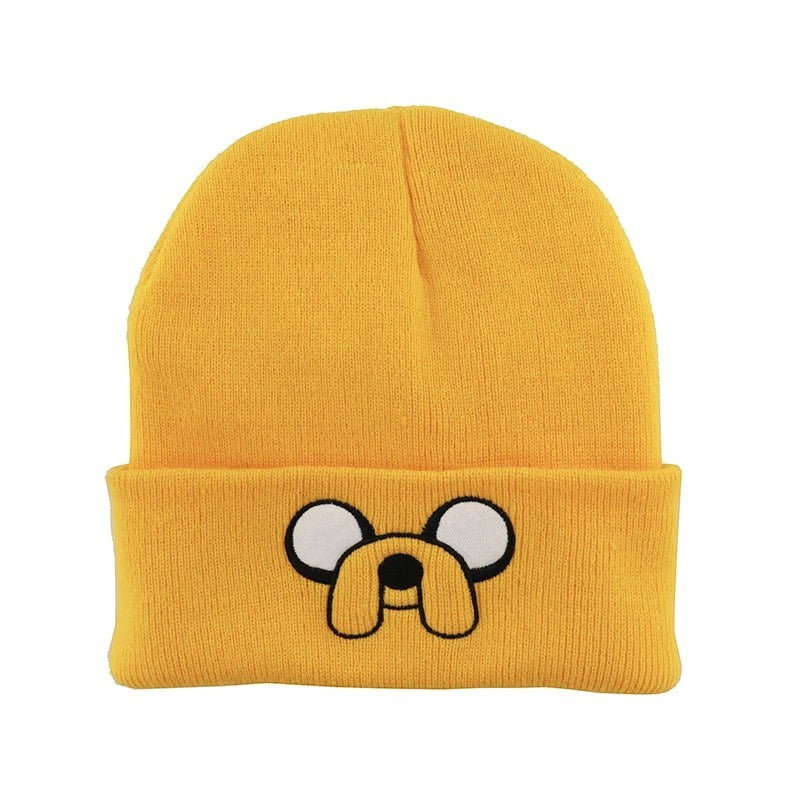 COMFORTHere yellow knit beanie hat with embroidered Jake the Dog face from Adventure Time. Features floppy ears and snout.