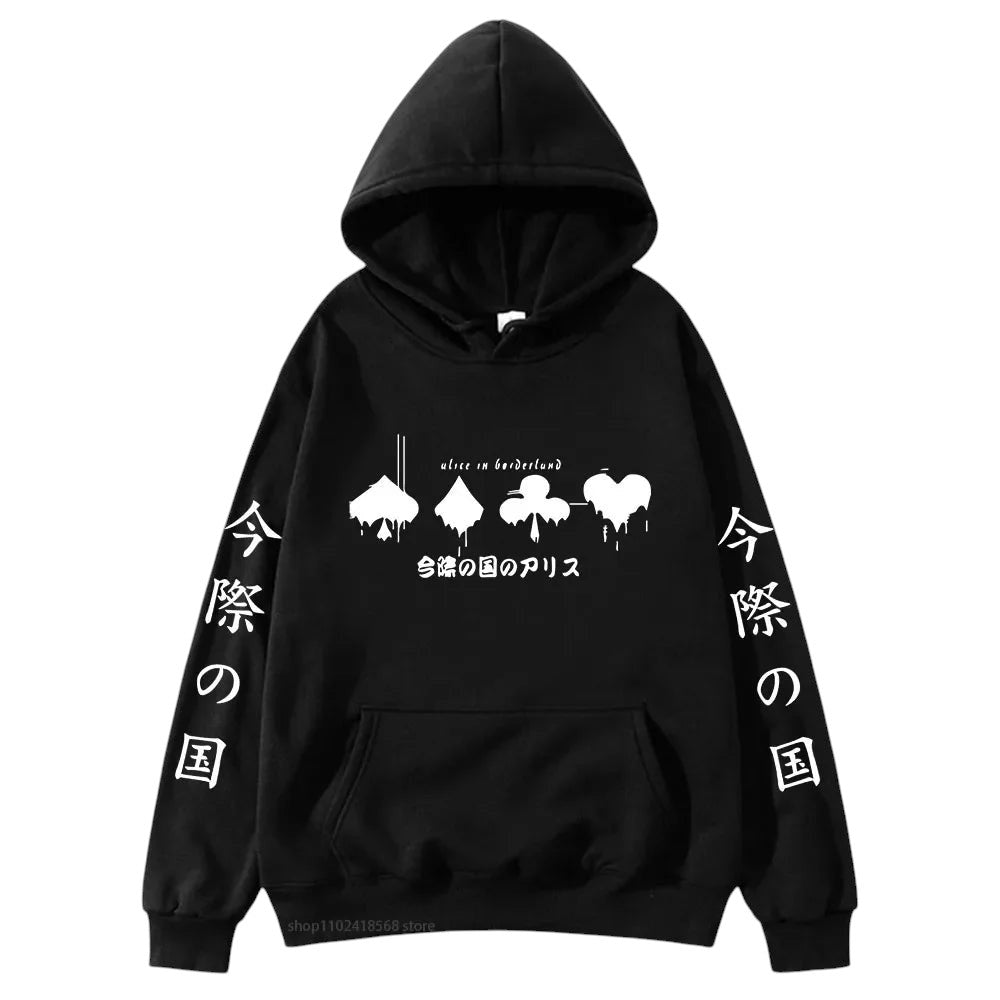 COMFORTHere Alice In Borderland graphic hoodie in black with card suit symbols and Japanese text. Features drawstring hood and front pocket.
