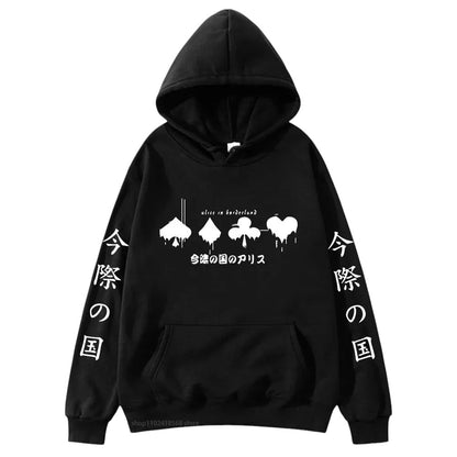 COMFORTHere Alice In Borderland graphic hoodie in black with card suit symbols and Japanese text. Features drawstring hood and front pocket.