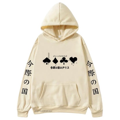 COMFORTHere Alice In Borderland graphic hoodie with card suit symbols and Japanese text. Cream cotton blend.