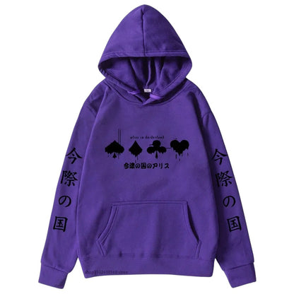 COMFORTHere Alice In Borderland graphic hoodie in purple with card suit symbols and Japanese text. Features drawstring hood and front pocket.
