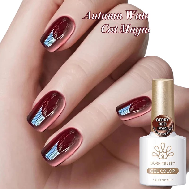 COMFORTHere's a bottle of Born Pretty Berry Red gel nail polish with a cat-eye effect. The nails are painted in a deep, shimmering burgundy with a magnetic effect.