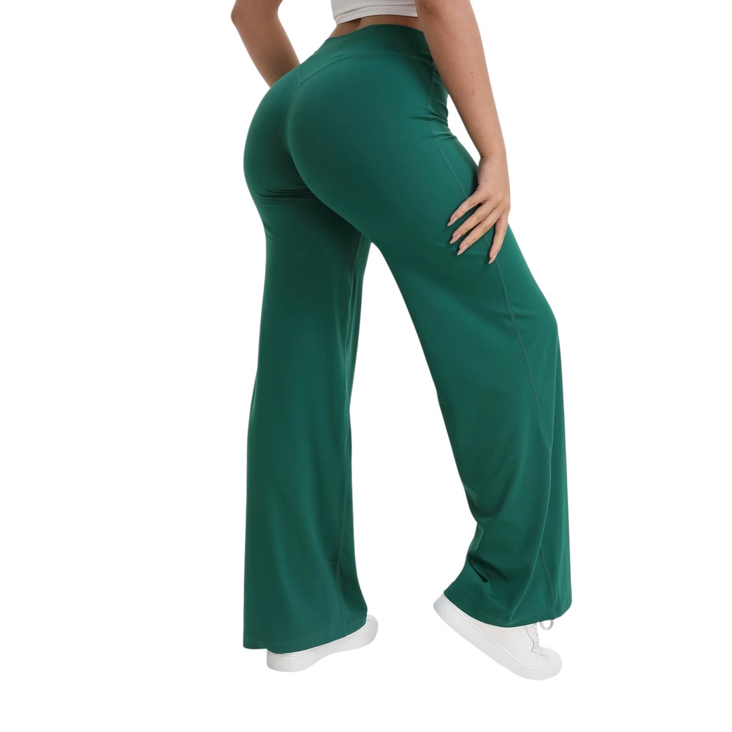 COMFORTHere green straight leg yoga pants with a mid-waist elastic band and naked-feel nylon fabric.