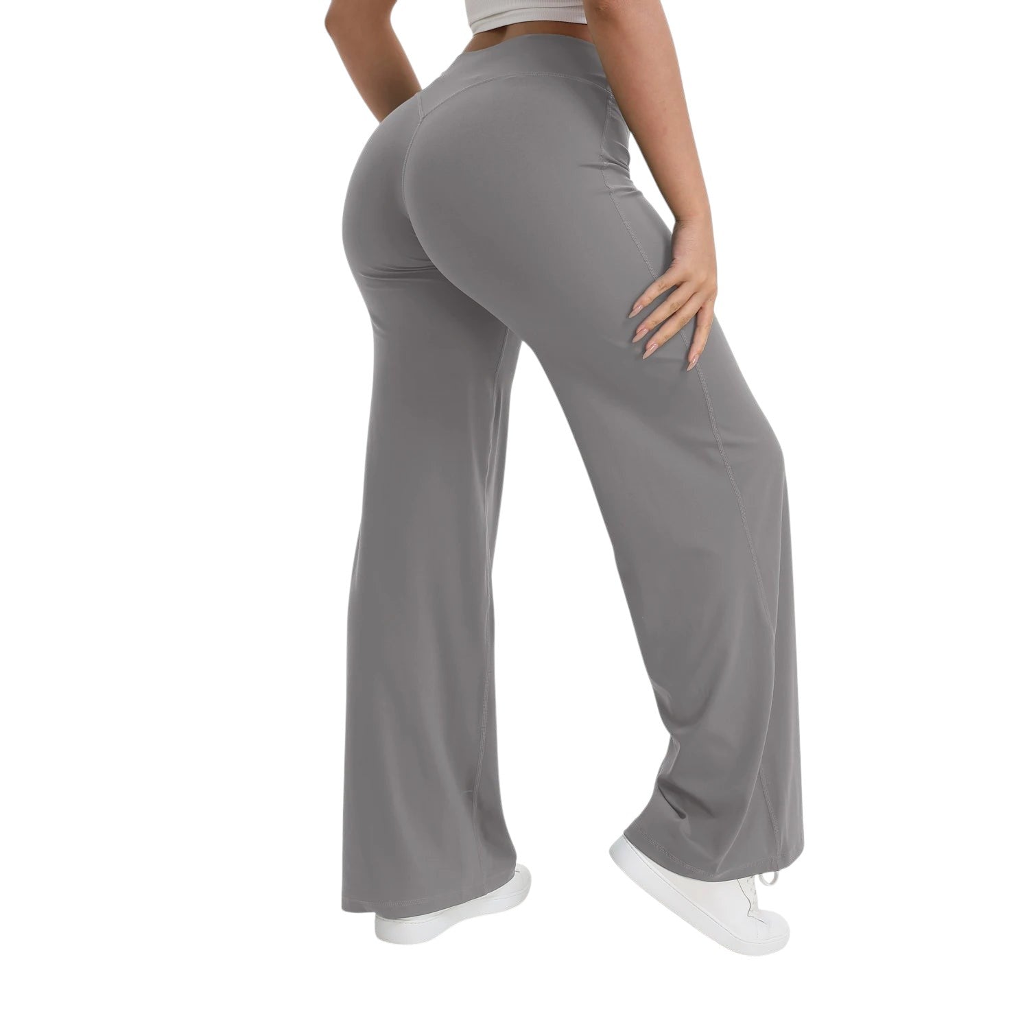 COMFORTHere grey straight leg yoga pants with a mid-waist elastic band and naked-feel nylon fabric.