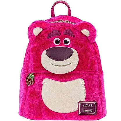 COMFORTHere pink plush Lotso Huggin' Bear backpack from Toy Story. Features embroidered face, strawberry charm, and Pixar Loungefly patch.