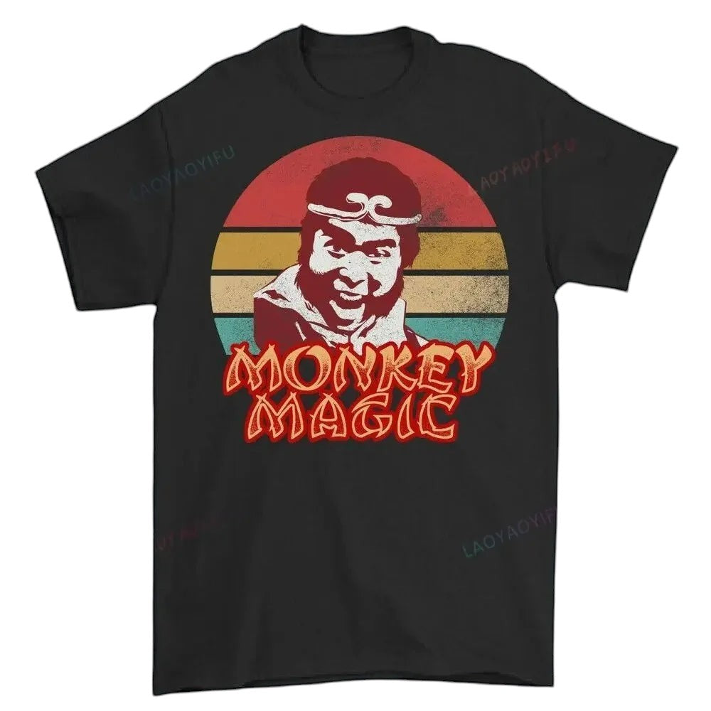 COMFORTHere Monkey Magic graphic t-shirt with a retro distressed sunset background and bold lettering. Black cotton.