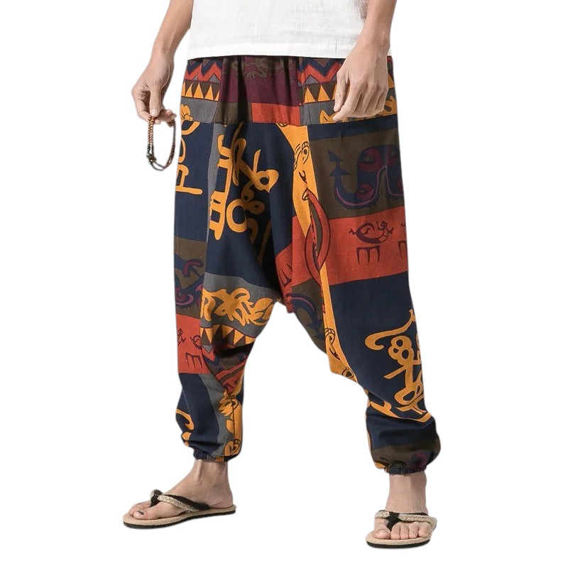 COMFORTHere patterned harem pants with a loose fit, drop crotch, and cuffed ankles. Features a bohemian-inspired print in navy, orange, and burgundy.