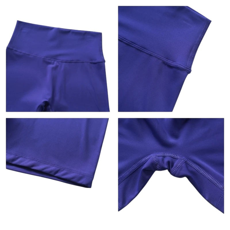 COMFORTHere high-waisted athletic shorts in deep purple. Stretchy, moisture-wicking fabric with seamless construction.