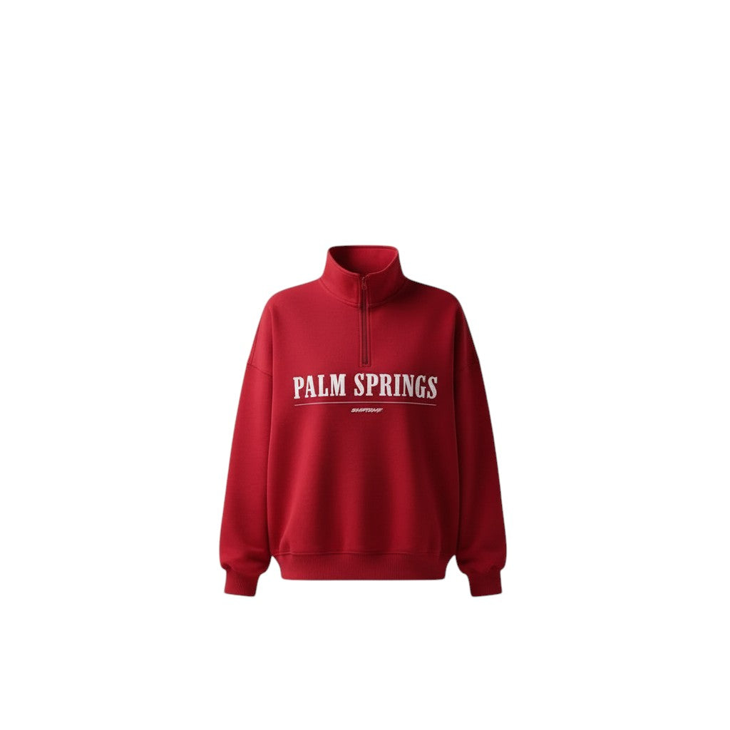 COMFORTHere red cotton blend quarter zip sweatshirt with "PALM SPRINGS" graphic on chest. Relaxed fit with ribbed cuffs and hem.