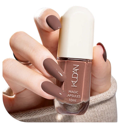COMFORTHere Water-Based Peel Off Nail Polish in a muted brown shade. 10ml bottle.