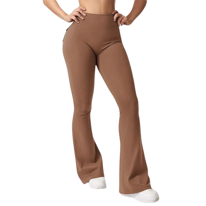 COMFORTHigh waisted brown flare yoga pants with pockets and ruched detailing on the back. Stretchy fabric.