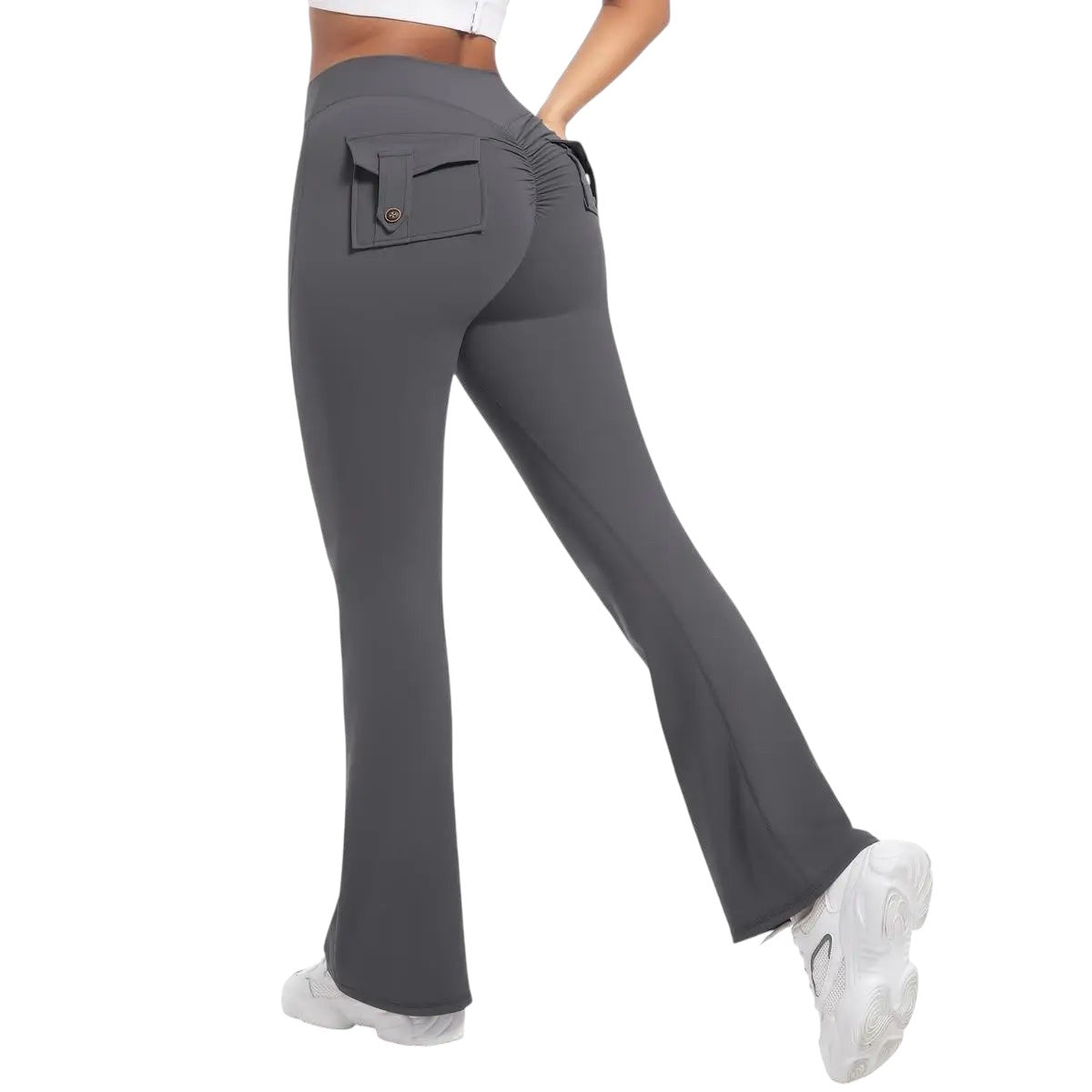 COMFORTHigh waisted flare yoga pants in dark grey with ruched back detail and functional back pockets.