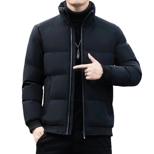 COMFORTS black quilted puffer jacket with stand collar, full zip, ribbed cuffs and hem. Men's outerwear.