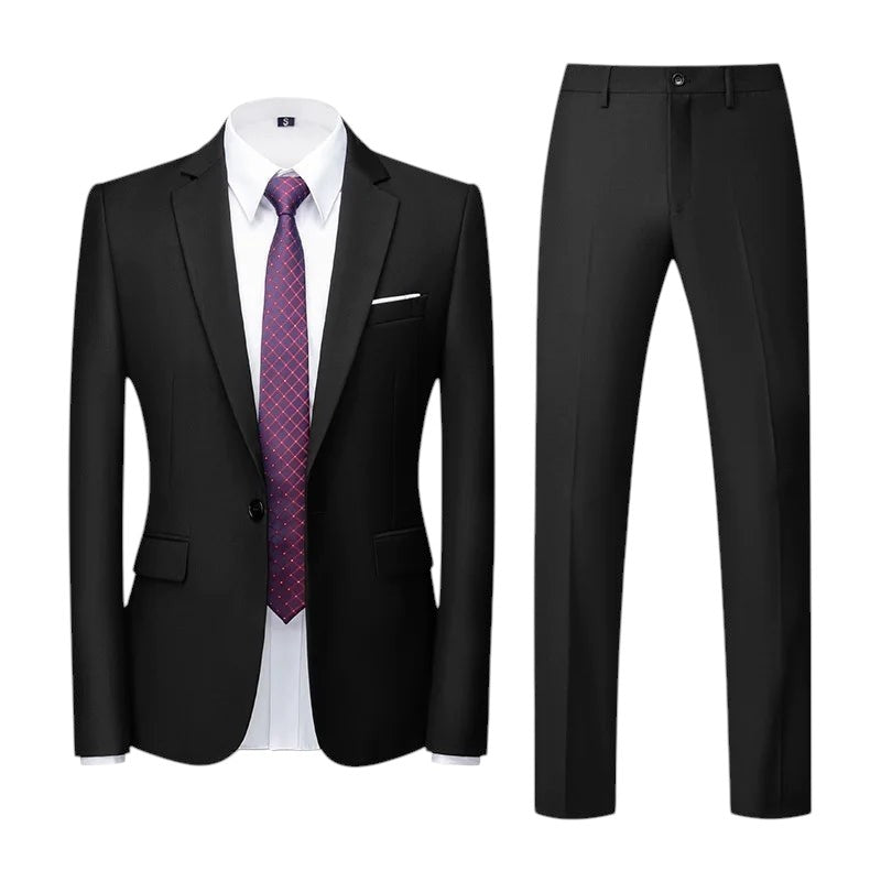 COMFORTS black polyester-viscose two-piece suit set with notch lapel jacket and flat-front trousers. Includes white shirt and patterned tie.