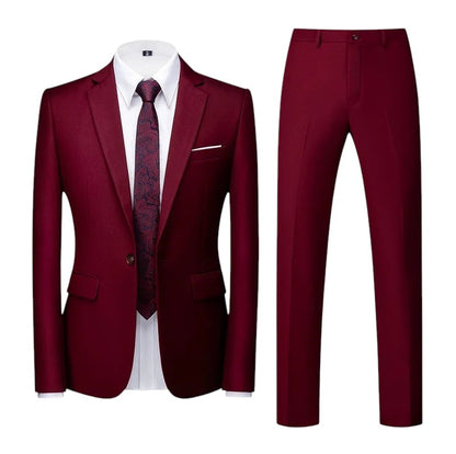 COMFORTS Men's two-piece burgundy suit set with notch lapel jacket and flat-front trousers. Polyester-viscose blend.