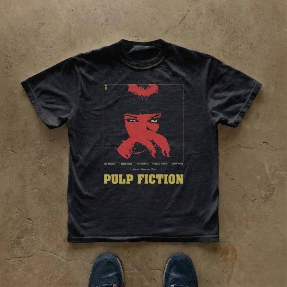 COMFORTS black cotton t-shirt with Pulp Fiction movie poster graphic featuring Uma Thurman's face in red.