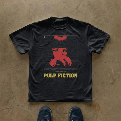 COMFORTS black cotton t-shirt with Pulp Fiction movie poster graphic featuring Uma Thurman's face in red.