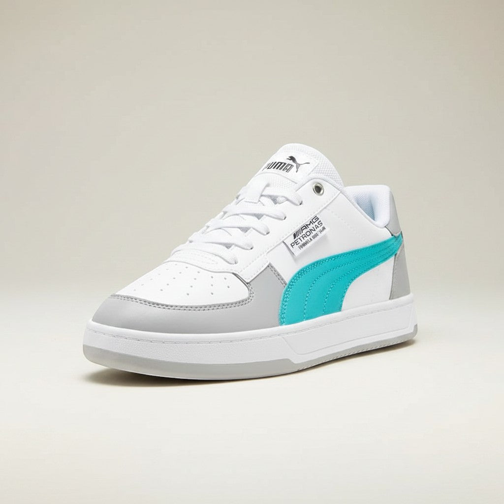COMFORTS Puma Mercedes AMG Petronas Caven 2.0 sneakers in white, grey, and teal. Synthetic upper with perforation details.
